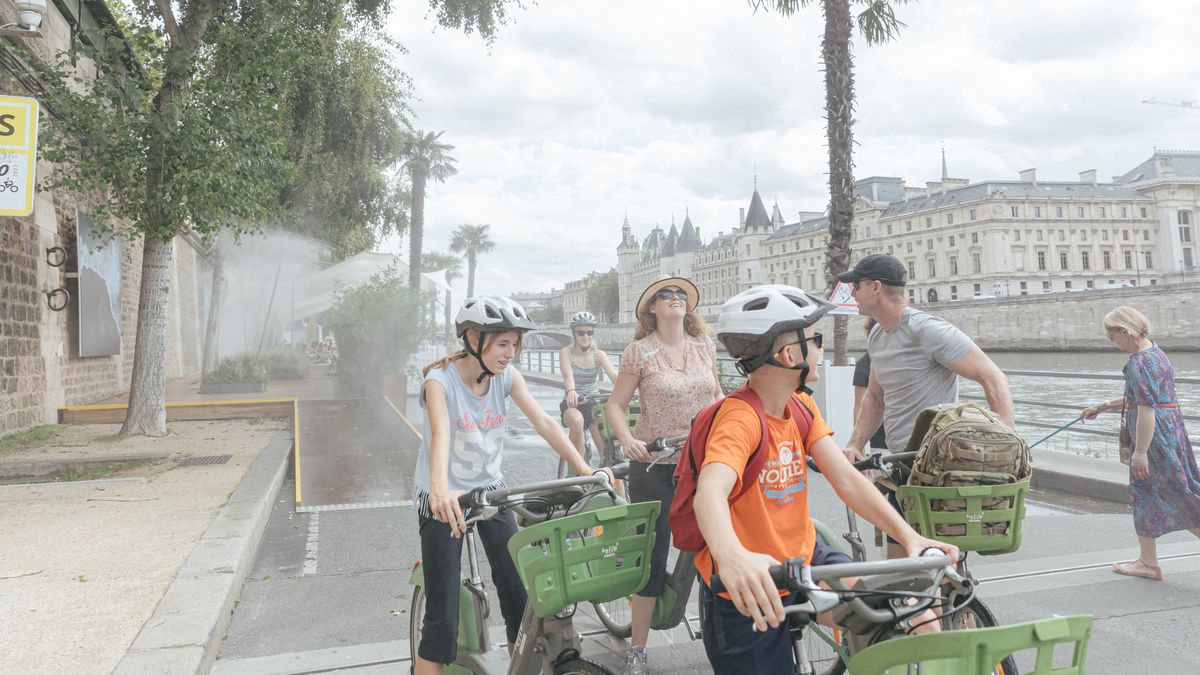 Fotky: Pařížané se brání vlně veder